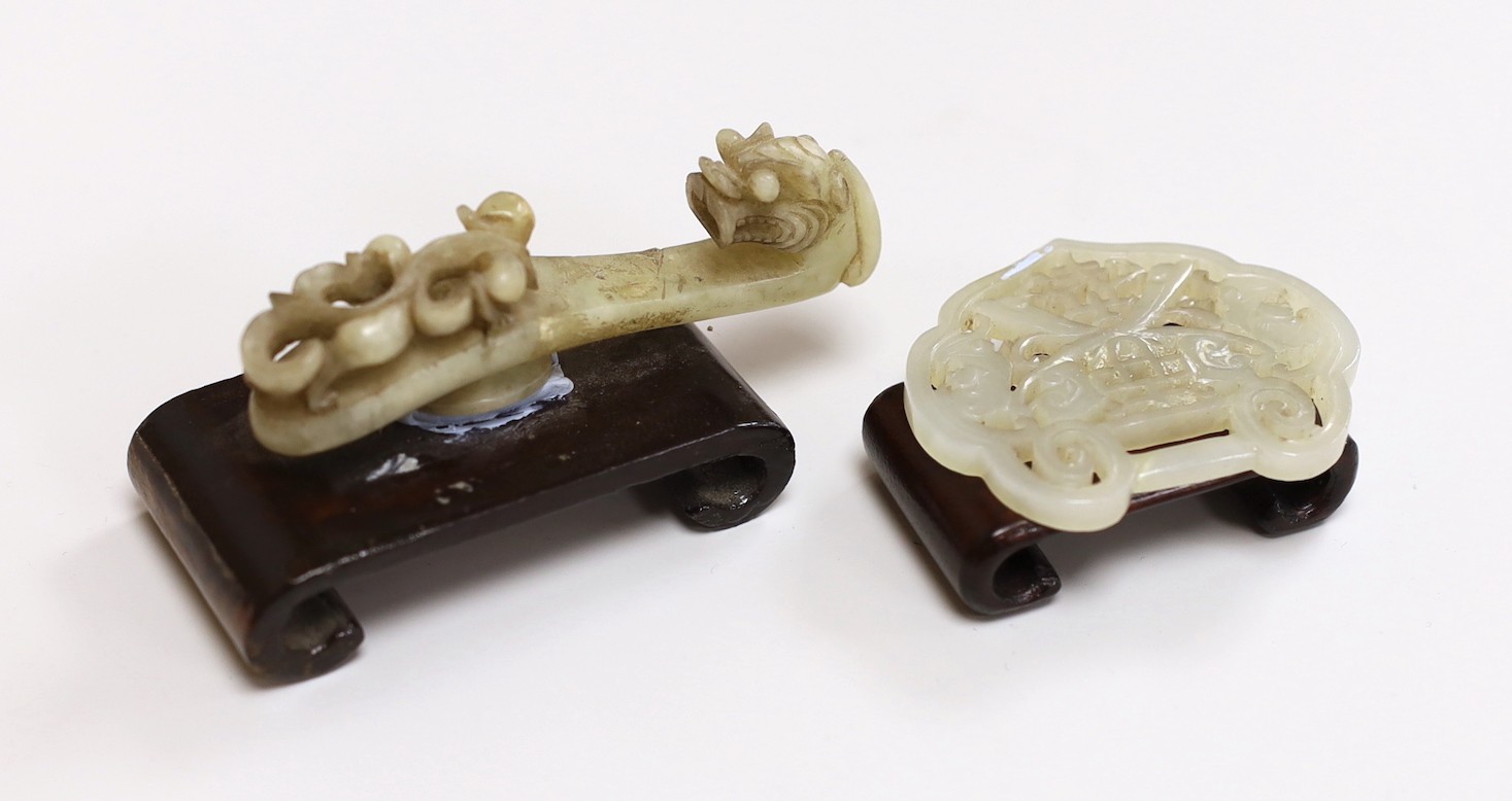 A Chinese jade belt hook and a spirit lock, belt hook, both 19th century, 8cms wide